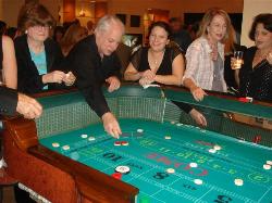 Casino Party Nights Florida, Inc. craps table at a casino event in Florida